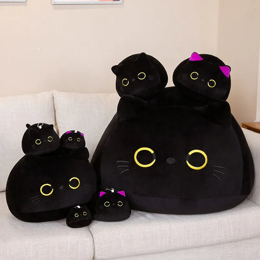 Black cat with purple ears plush toy